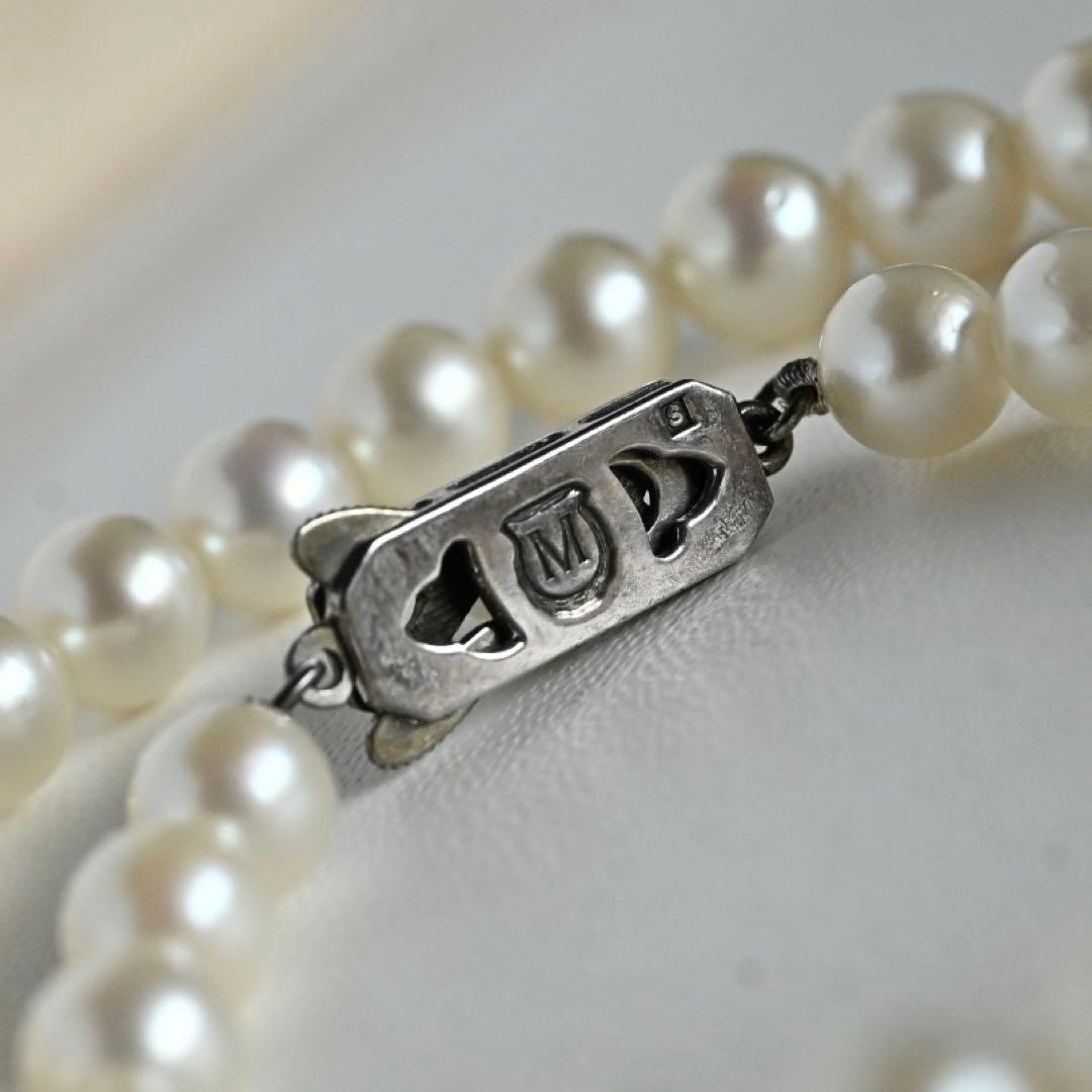 Highest grade Hanadama Mikimoto Akoya pearl necklace with 6.5mm round pearls and silver chain length 37cm