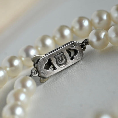 Highest grade Hanadama Mikimoto Akoya pearl necklace with 6.5mm round pearls and silver chain length 37cm