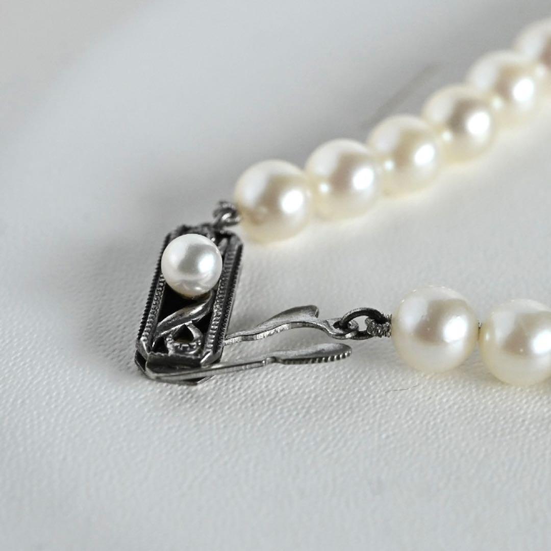 Highest grade Hanadama Mikimoto Akoya pearl necklace with 6.5mm round pearls and silver chain length 37cm