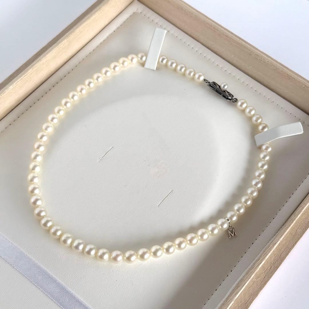 Highest grade Hanadama Mikimoto Akoya pearl necklace with 6.5mm round pearls and silver chain length 37cm