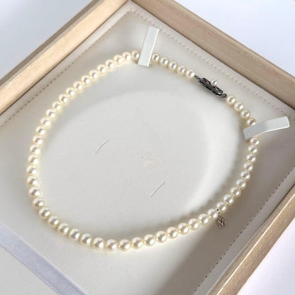 Highest grade Hanadama Mikimoto Akoya pearl necklace with 6.5mm round pearls and silver chain length 37cm