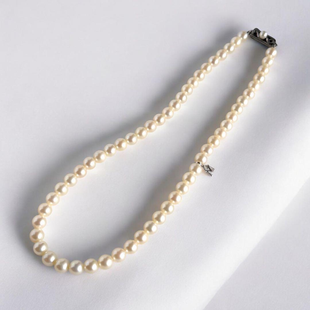 Highest grade Hanadama Mikimoto Akoya pearl necklace with 6.5mm round pearls and silver chain length 37cm
