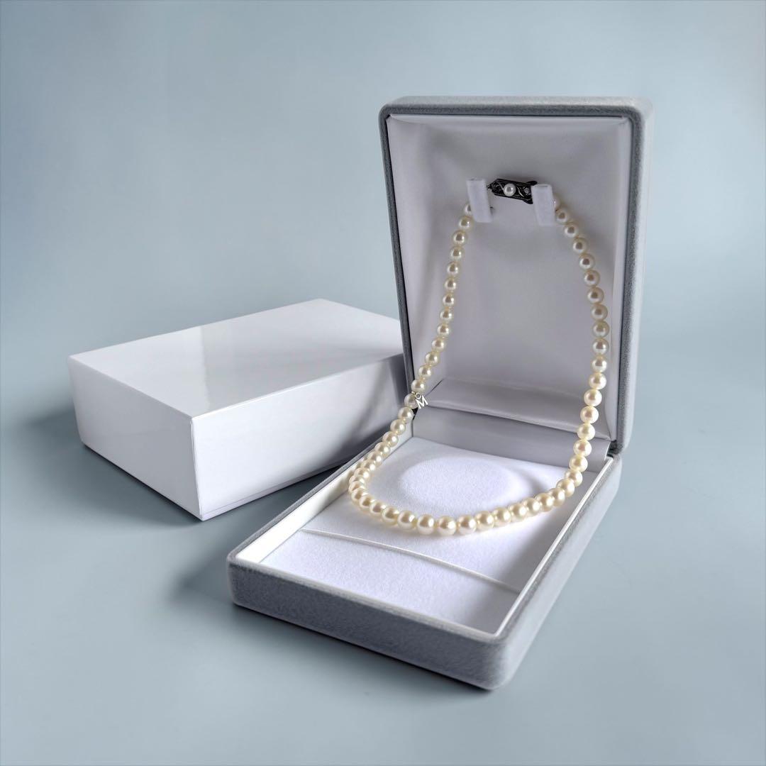 Highest grade Hanadama Mikimoto Akoya pearl necklace with 6.5mm round pearls and silver chain length 37cm