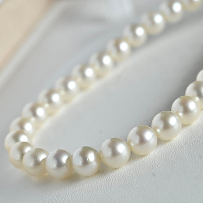 Highest grade Hanadama Mikimoto Akoya pearl necklace with 6.5mm round pearls and silver chain length 37cm
