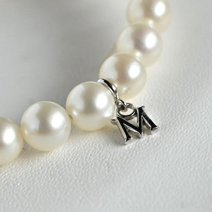 Highest grade Hanadama Mikimoto Akoya pearl necklace with 6.5mm round pearls and silver chain length 37cm