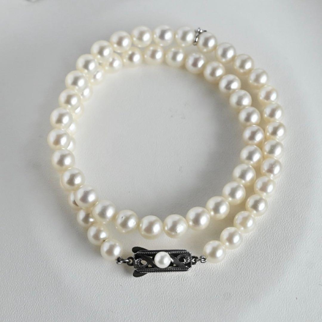 Highest grade Hanadama Mikimoto Akoya pearl necklace with 6.5mm round pearls and silver chain length 37cm