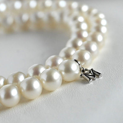 Highest grade Hanadama Mikimoto Akoya pearl necklace with 6.5mm round pearls and silver chain length 37cm