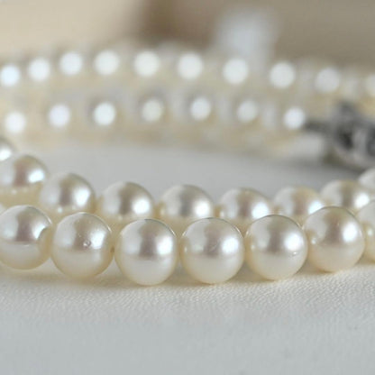 Highest grade Hanadama Mikimoto Akoya pearl necklace with 6.5mm round pearls and silver chain length 37cm