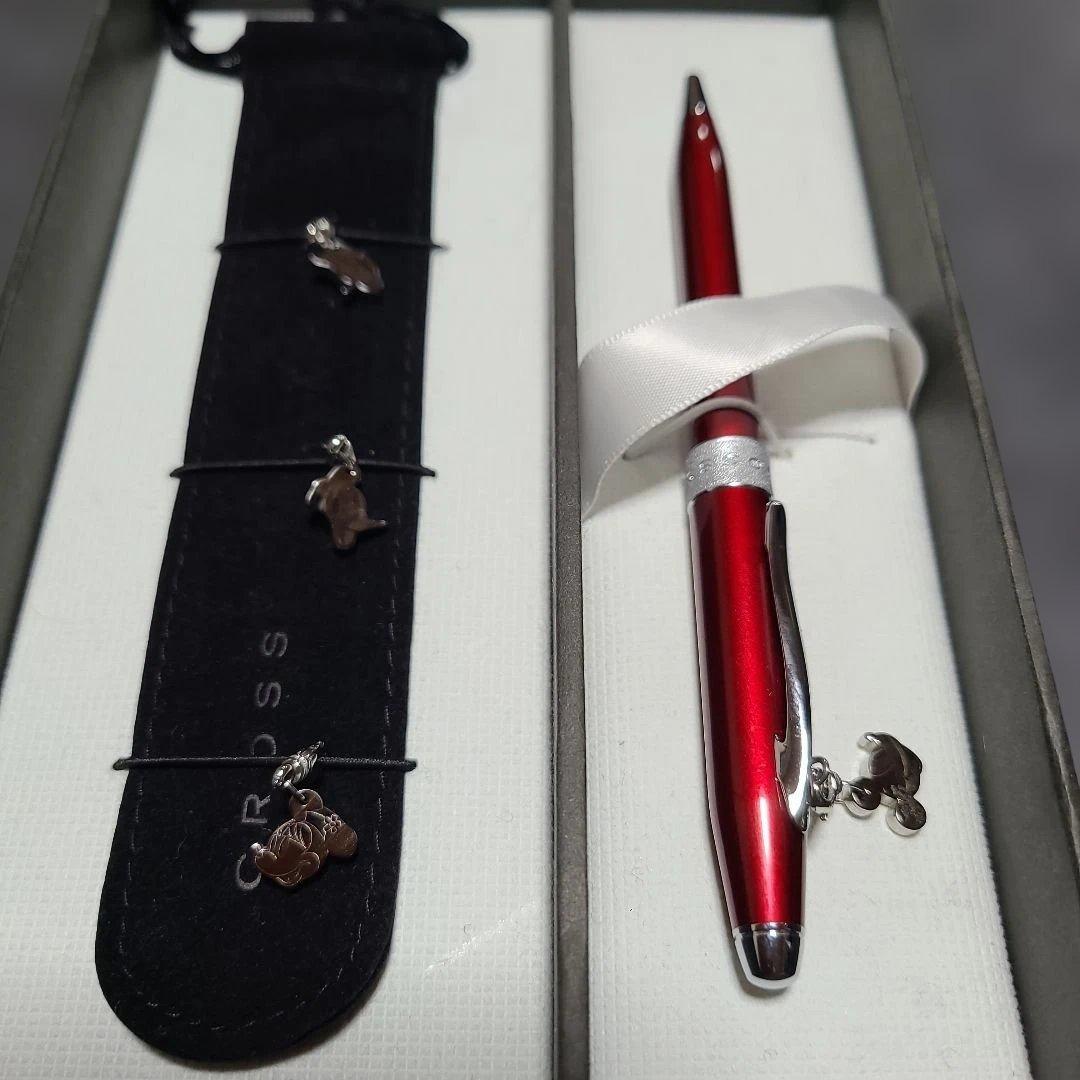 Red Sentiment ballpoint pen by CROSS with metal body and charm with ribbon, simple and elegant design