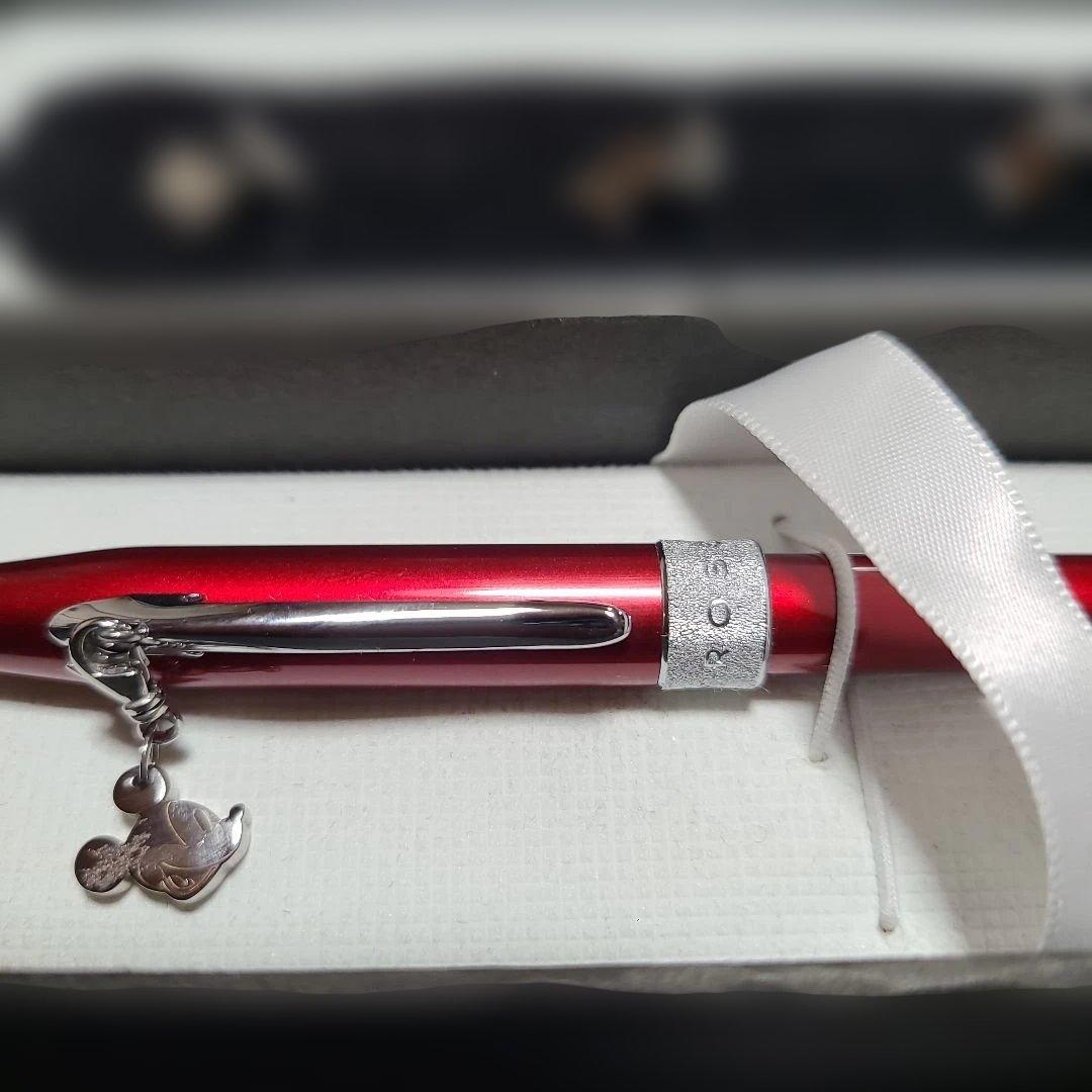 Red Sentiment ballpoint pen by CROSS with metal body and charm with ribbon, simple and elegant design