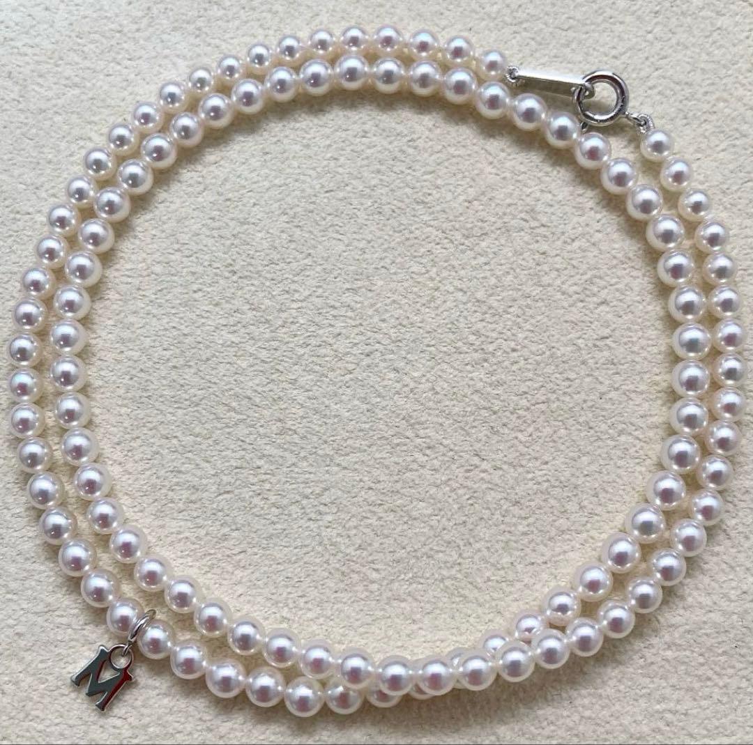 Mikimoto baby pearl necklace with 3.5-4mm pearls, silver lever clasp, and M charm on a 42cm chain