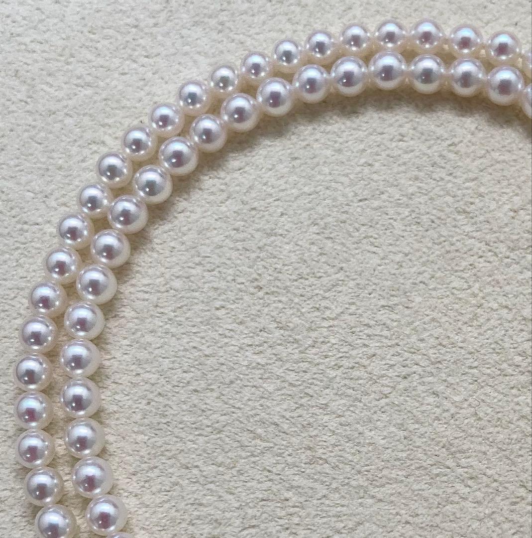 Mikimoto baby pearl necklace with 3.5-4mm pearls, silver lever clasp, and M charm on a 42cm chain