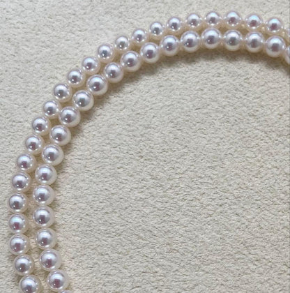Mikimoto baby pearl necklace with 3.5-4mm pearls, silver lever clasp, and M charm on a 42cm chain