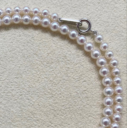 Mikimoto baby pearl necklace with 3.5-4mm pearls, silver lever clasp, and M charm on a 42cm chain