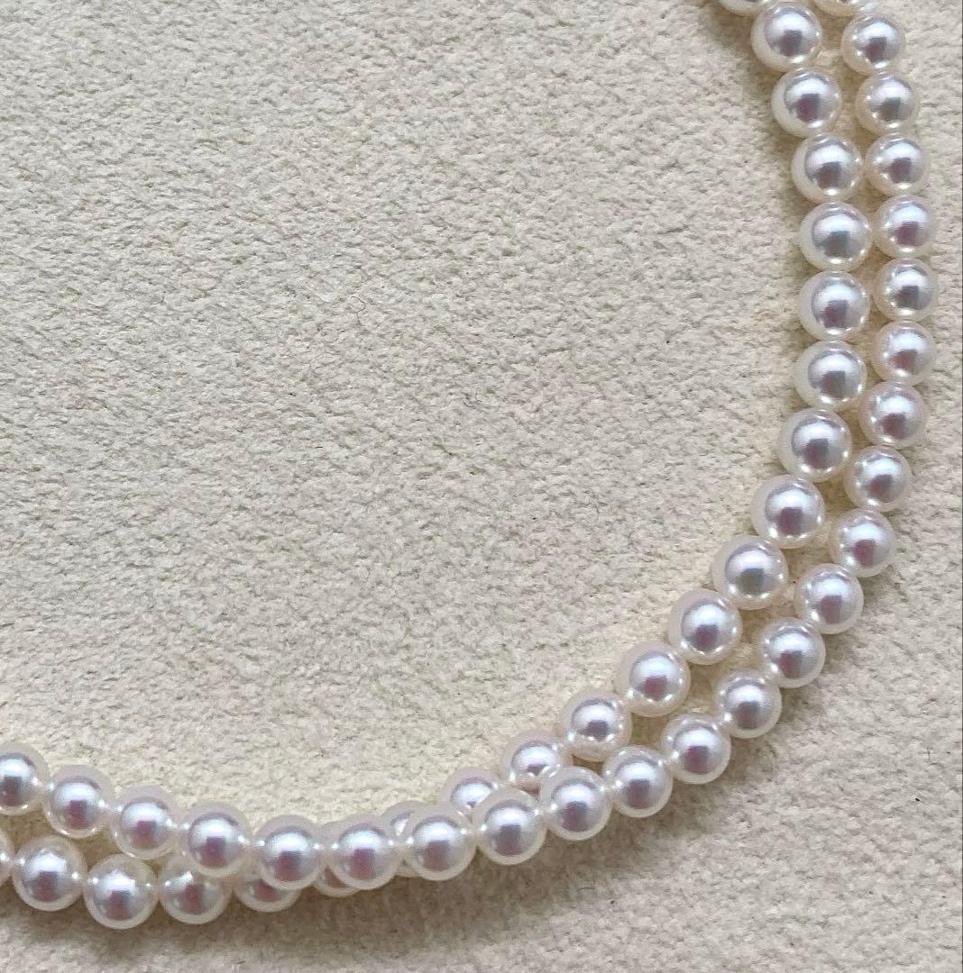 Mikimoto baby pearl necklace with 3.5-4mm pearls, silver lever clasp, and M charm on a 42cm chain