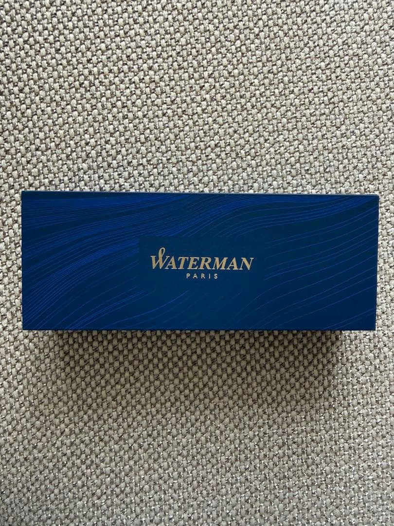 New WATERMAN ballpoint pen in brown color with fine and broad refills, shown unused