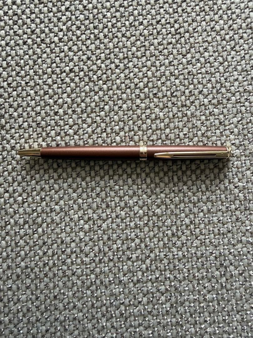 New WATERMAN ballpoint pen in brown color with fine and broad refills, shown unused