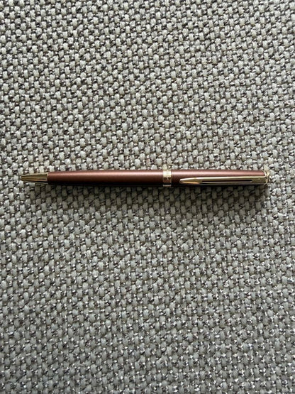 New WATERMAN ballpoint pen in brown color with fine and broad refills, shown unused