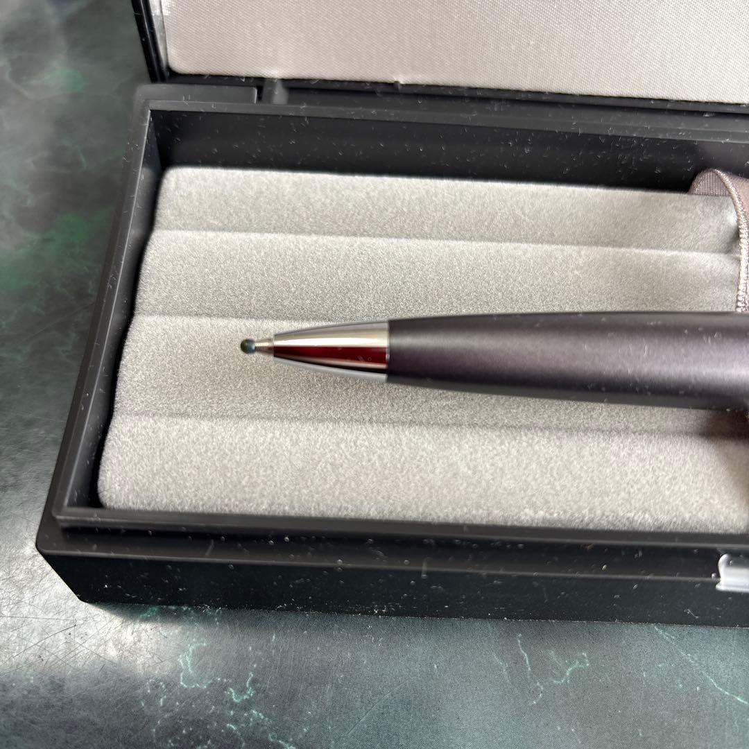 PILOT Cocoon oil-based ballpoint pen in gray with logo displayed with case