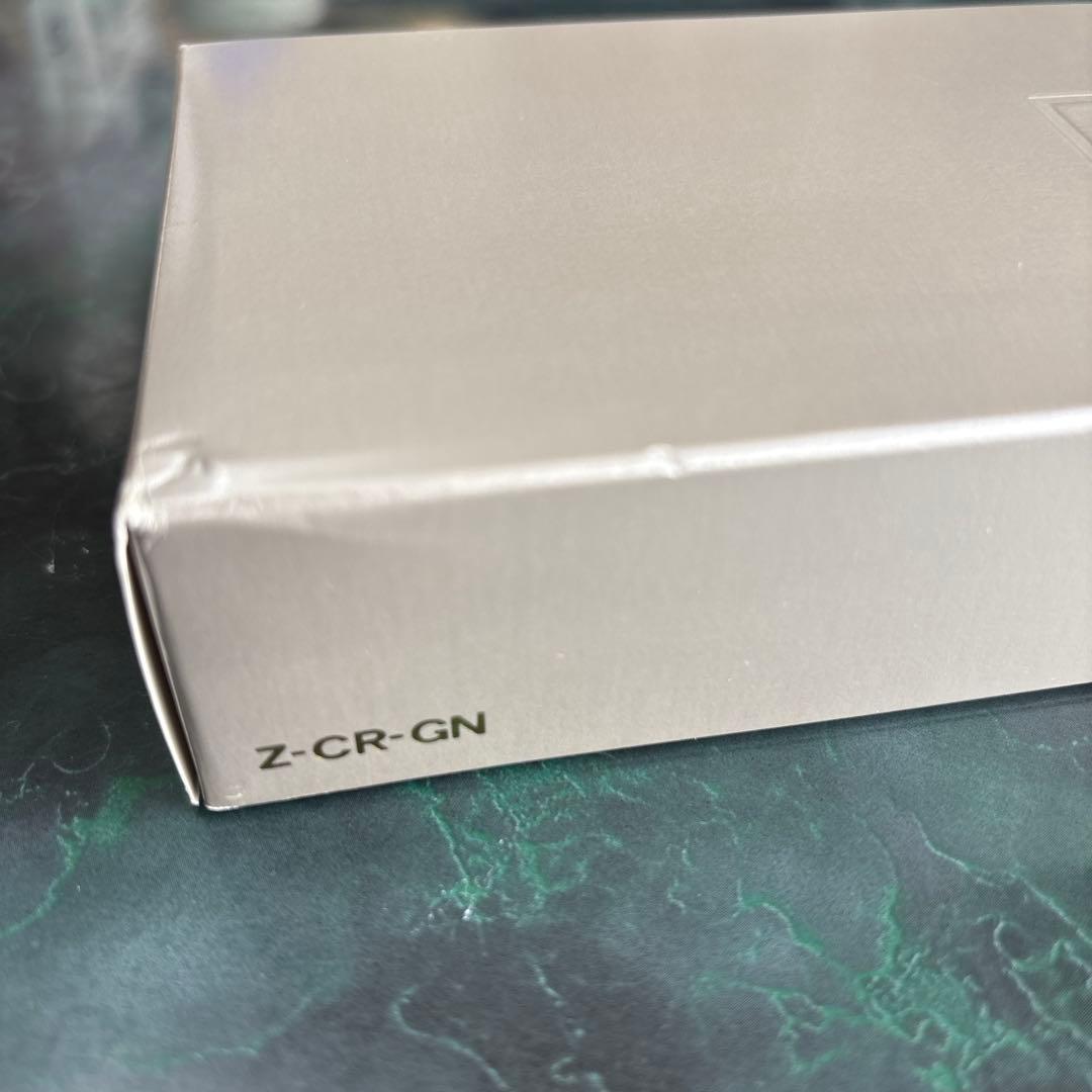 PILOT Cocoon oil-based ballpoint pen in gray with logo displayed with case