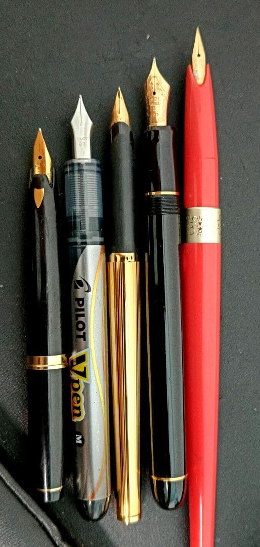 Set of 5 fountain pens including PILOT brand with 21K and 14K gold nibs in black, red, and silver colors