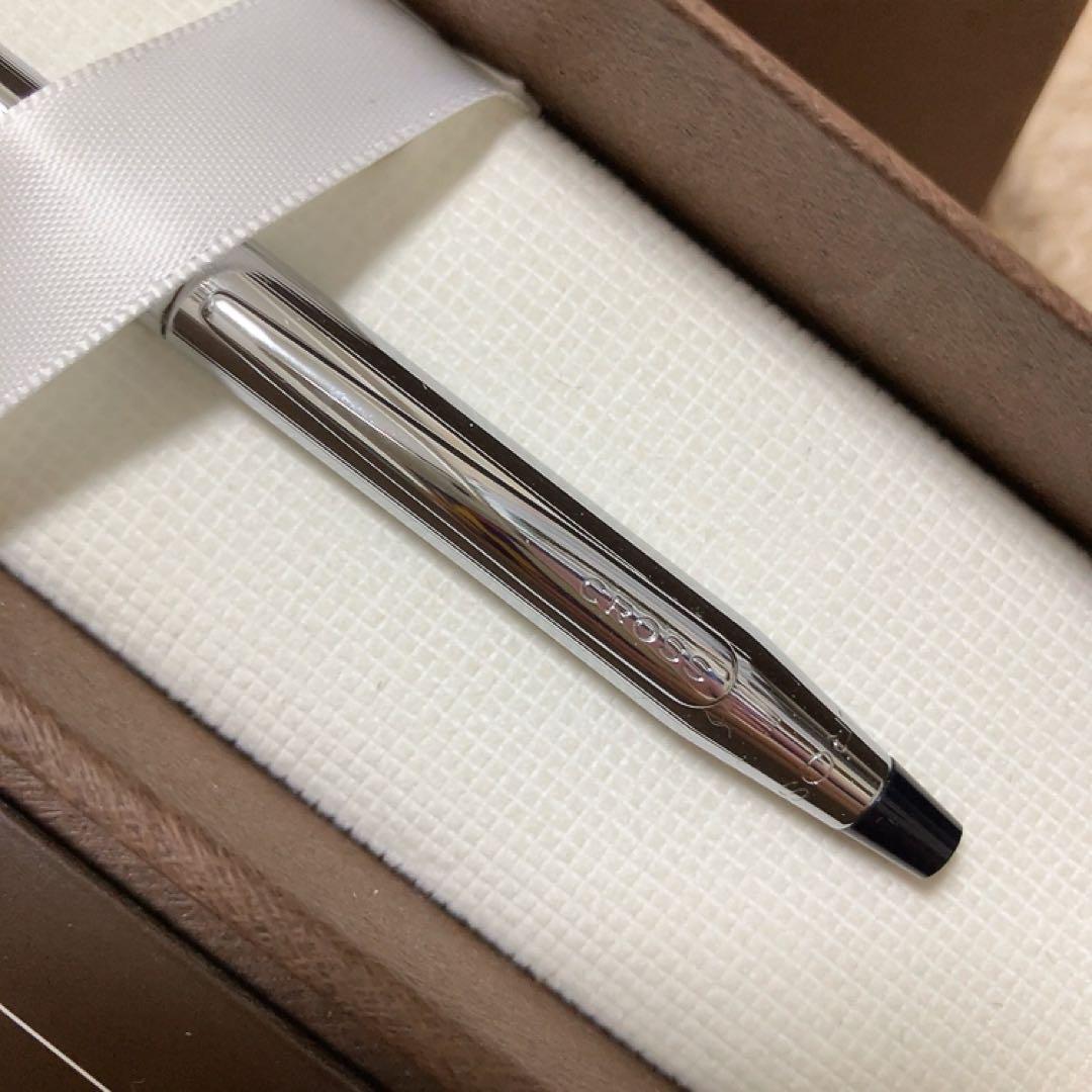 Silver CROSS ballpoint pen with a dedicated protective case on a white background