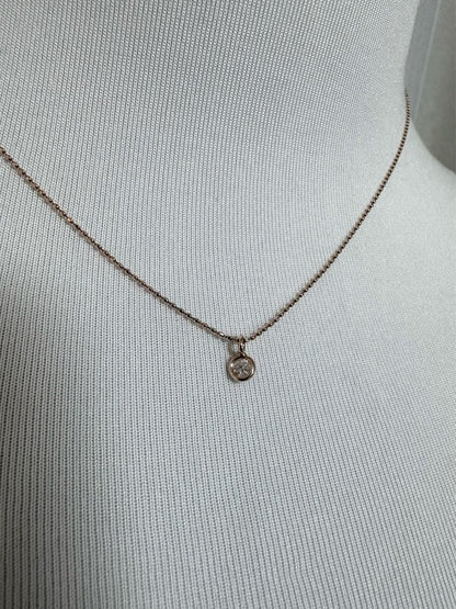 Agete K10 gold necklace with 0.1ct diamond pendant measuring 41 cm length