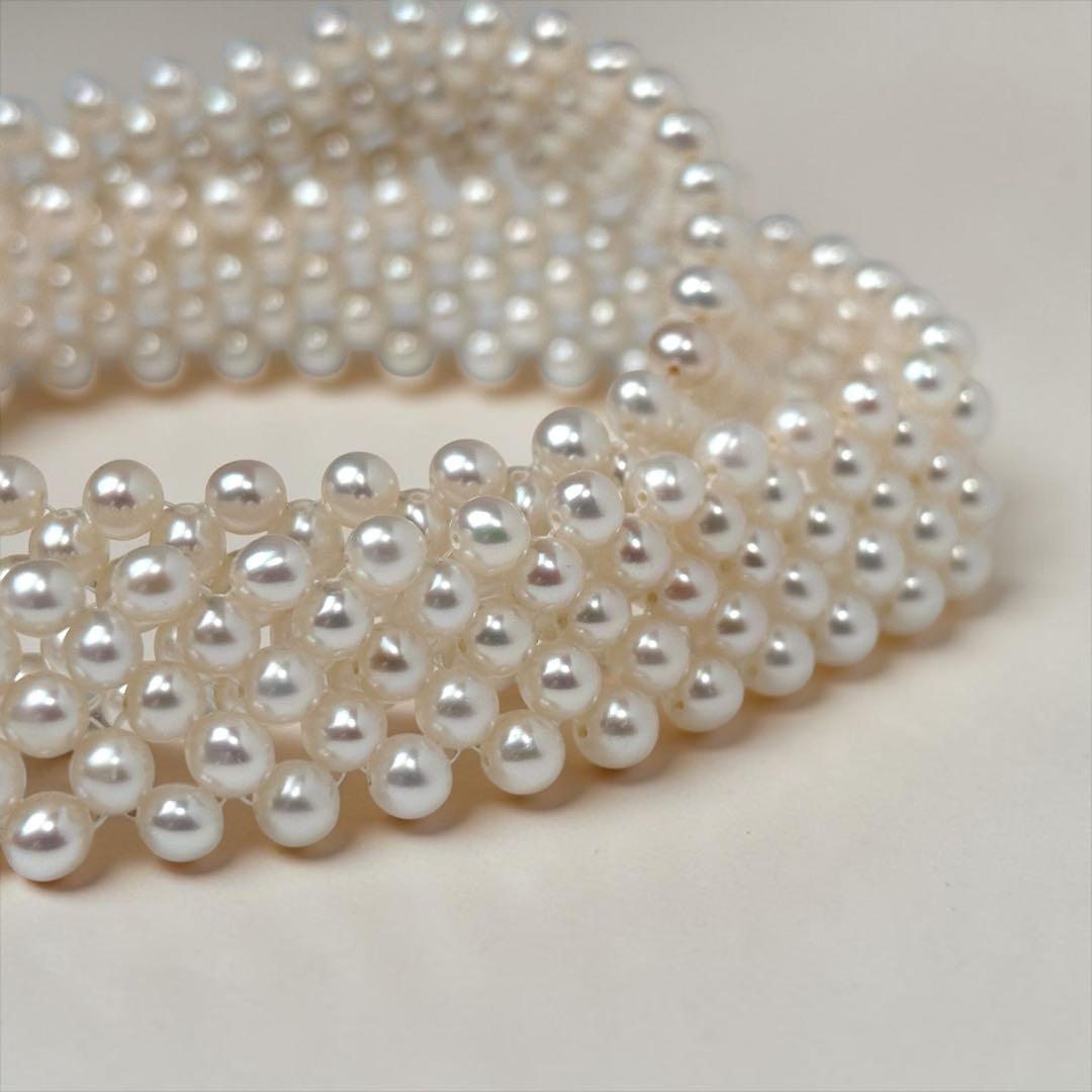 Small pearl three-row knitted necklace with 4.2mm pearls and 45cm length featuring an insert-shaped clasp