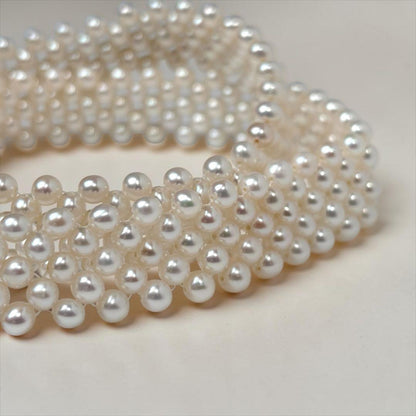 Small pearl three-row knitted necklace with 4.2mm pearls and 45cm length featuring an insert-shaped clasp
