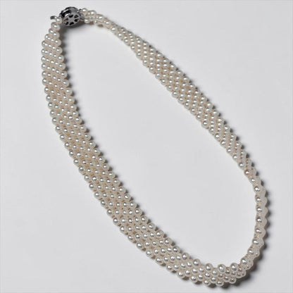 Small pearl three-row knitted necklace with 4.2mm pearls and 45cm length featuring an insert-shaped clasp