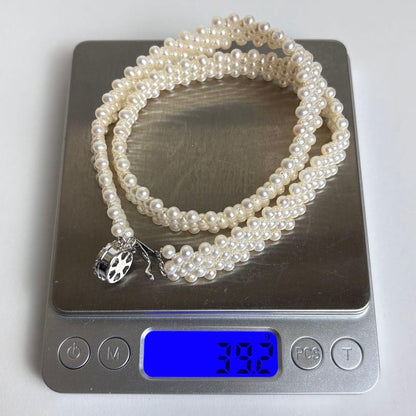 Small pearl three-row knitted necklace with 4.2mm pearls and 45cm length featuring an insert-shaped clasp