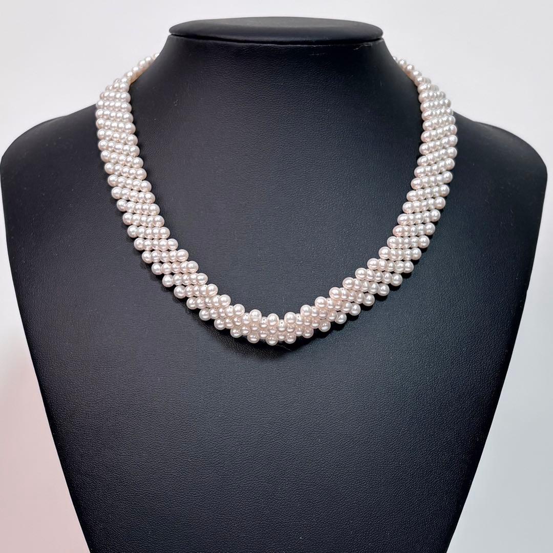 Small pearl three-row knitted necklace with 4.2mm pearls and 45cm length featuring an insert-shaped clasp