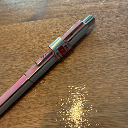 PILOTQUATRO fine black ballpoint pen in pink and white with silver striped design