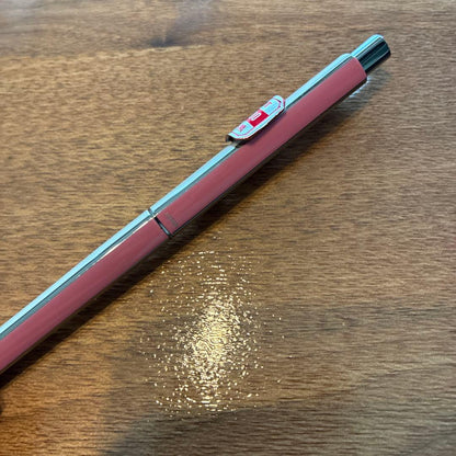 PILOTQUATRO fine black ballpoint pen in pink and white with silver striped design