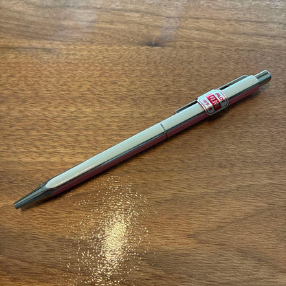 PILOTQUATRO fine black ballpoint pen in pink and white with silver striped design