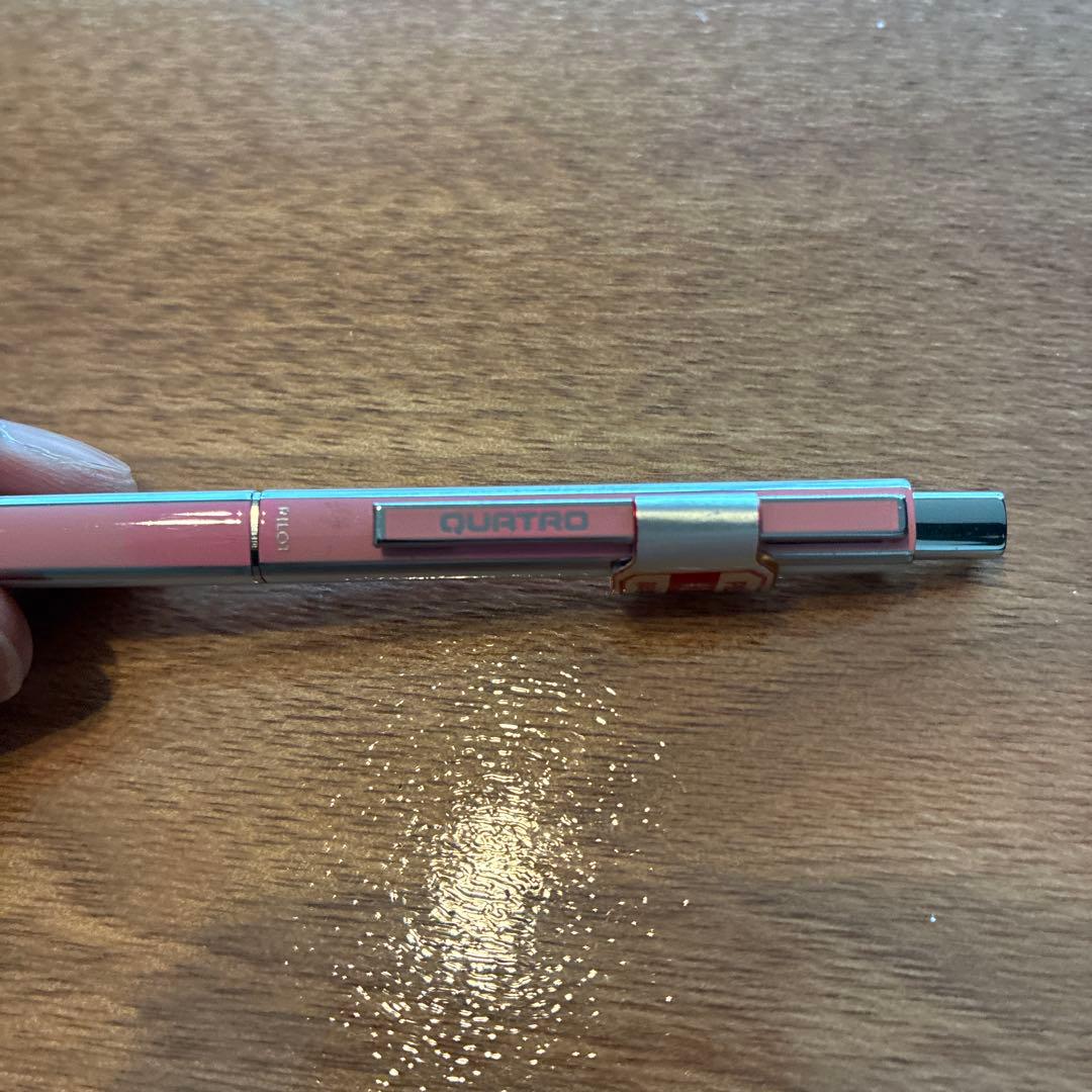 PILOTQUATRO fine black ballpoint pen in pink and white with silver striped design