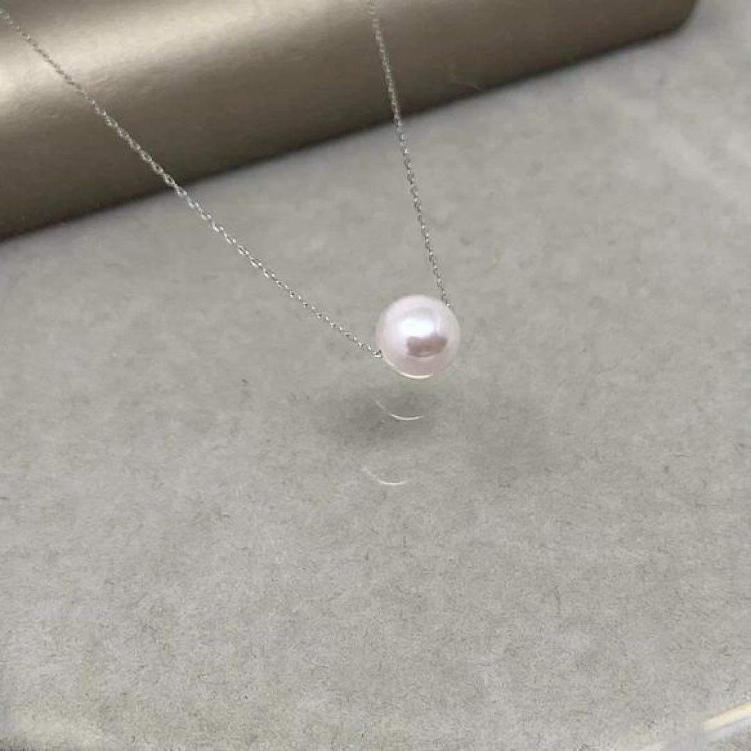 PT850 platinum Akoya pearl thread necklace with 7mm pearls and 40cm chain displayed on white background