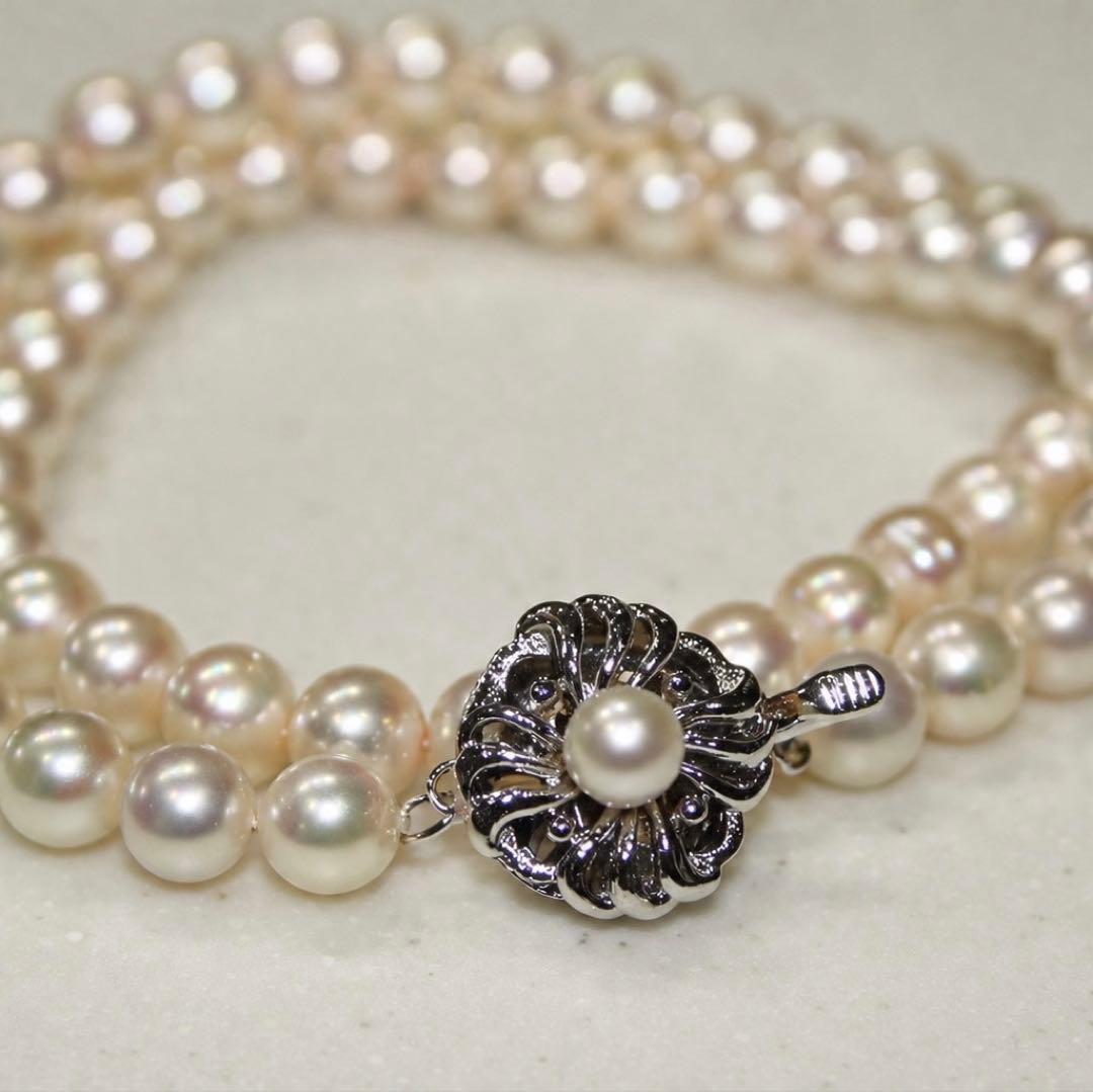 Akoya pearl necklace with 7.0-7.31mm pearls silver stamp displayed with a box