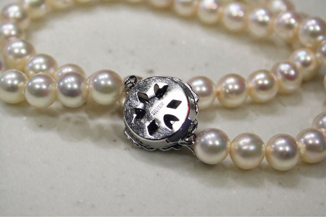 Akoya pearl necklace with 7.0-7.31mm pearls silver stamp displayed with a box