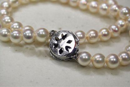 Akoya pearl necklace with 7.0-7.31mm pearls silver stamp displayed with a box