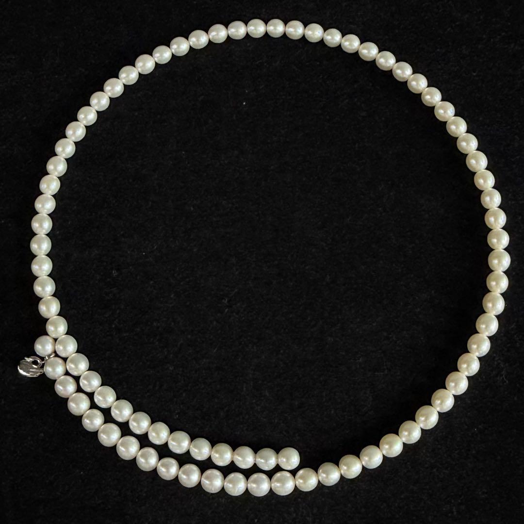 Highest grade TASAKI Akoya pearl choker necklace with 51.5 cm length shown on white background