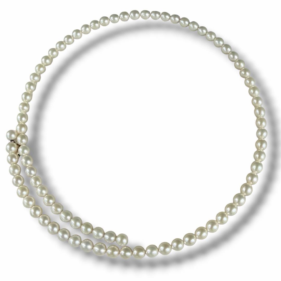 Highest grade TASAKI Akoya pearl choker necklace with 51.5 cm length shown on white background