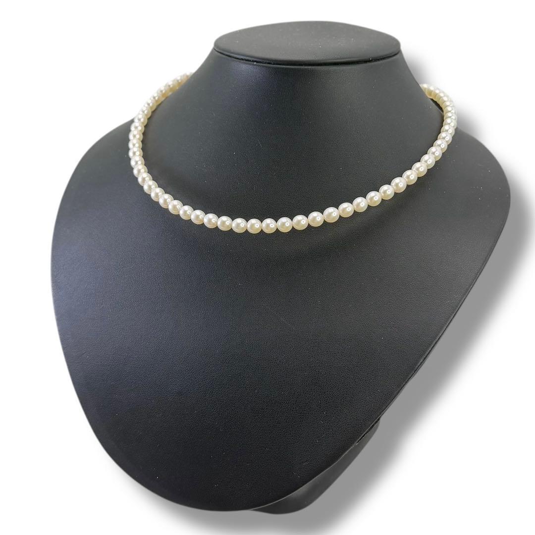 Highest grade TASAKI Akoya pearl choker necklace with 51.5 cm length shown on white background