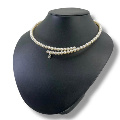 Highest grade TASAKI Akoya pearl choker necklace with 51.5 cm length shown on white background