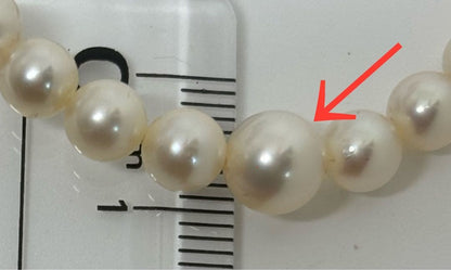 Mikimoto pearl necklace approximately 42.2 cm (16.6 inches) long with lustrous white pearls