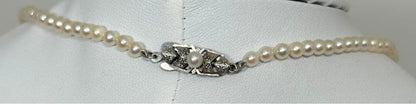 Mikimoto pearl necklace approximately 42.2 cm (16.6 inches) long with lustrous white pearls