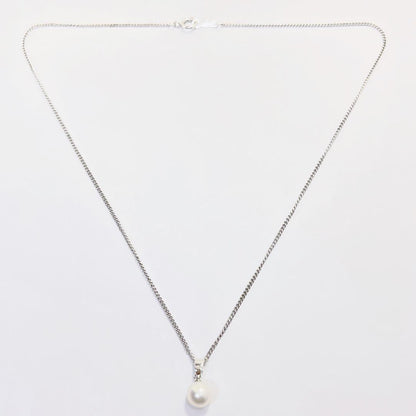 Mikimoto pearl pendant necklace with 7mm pearl on silver chain 40cm long