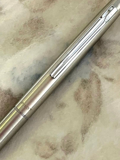 Set of two CROSS and PILOT ballpoint pens with minor scratches shown on the pen bodies