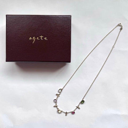 Agete silver 925 feather necklace with multi-color stones including blue topaz, amethyst, citrine, and tourmalines