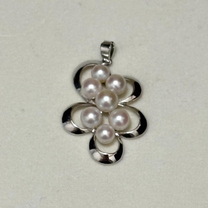 Akoya pearl necklace with baby pearls measuring approximately 4.5-5.6mm in size